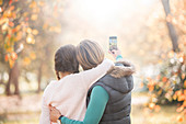 Mother and daughter taking selfie