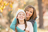 Portrait Mother and daughter hugging