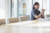 Businesswoman at conference table