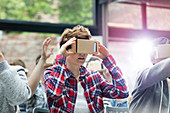 Woman trying virtual reality glasses