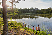 Grandparents and grandchildren fishing