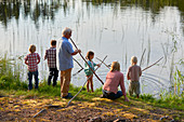 Grandparents and grandchildren camping