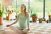 Pregnant woman meditating