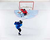 Hockey player scoring a goal