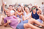 Friends with beer at music festival