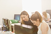 Businesswomen meeting at computer