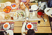 Friends enjoying lunch at patio table