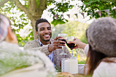 Couple toasting wine glasses