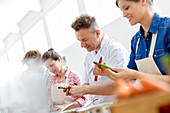Teacher and students in cooking class