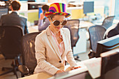 Businesswoman wearing silly sunglasses