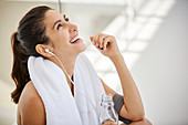 Laughing woman resting post workout