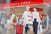 Women leaving airport duty free shop