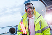 Portrait smiling air traffic controller