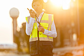 Air traffic controller using walkie-talkie