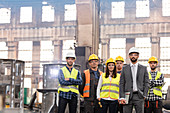 Portrait confident manager and steel worker team