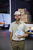 Truck driver worker with clipboard