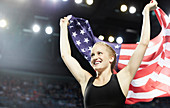 Female runner with American flag