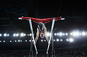 Male gymnast on parallel bars