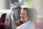 Businesswoman laughing in meeting