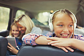 Smiling girl listening to music