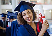 Female college graduate in cap and gown