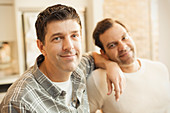 Portrait confident male gay couple