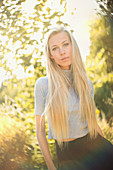 Blonde teenage girl outdoors