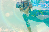Boy snorkelling underwater