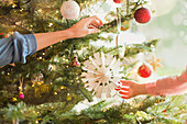 Mother and daughter hanging snowflake ornament