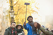 Young couple friends taking selfie