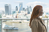 Businesswoman looking at city view