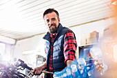 Male motorcycle mechanic working