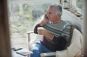 Senior man talking on cell phone