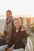 Portrait mature couple drinking wine