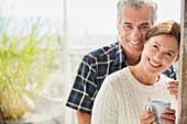 Portrait mature couple drinking coffee