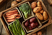 Fresh vegetable harvest variety in wood crate