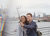 Tourists taking selfie, London, UK