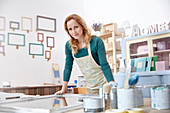 Portrait artist painting mirror in art studio