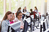 Girl students studying at computer