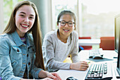 Portrait girl students researching at computer