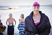 Portrait smiling, confident female swimmer