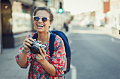 Portrait laughing, tourist in sunglasses