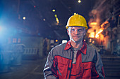 Portrait confident steelworker in steel mill