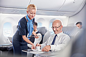 Flight attendant serving espresso
