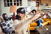 Woman gesturing, using VR simulator glasses
