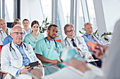 Surgeons, doctors and nurses in conference