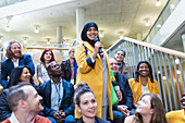 Smiling woman in hijab speaking