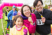 Portrait family runners showing medals