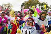 Portrait runners with Holi powder