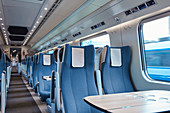 Seats and table on empty train